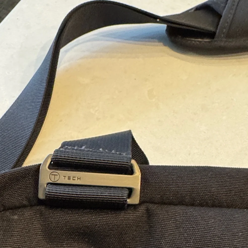 Tumi Black Messenger Bag excellent condition stay organized.
